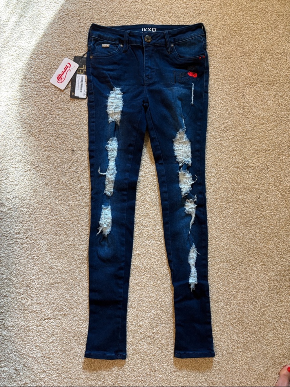 Distressed Dark Blue Women’s Skinny Jeans